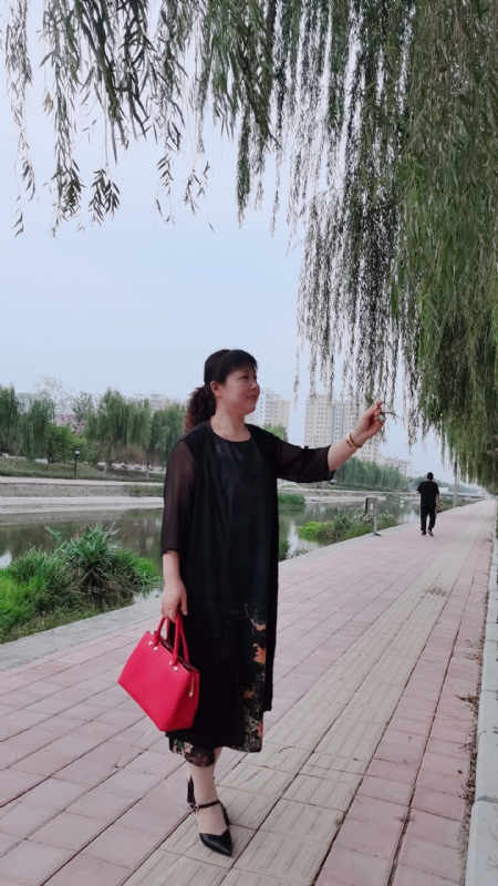 周本玲的第一张照片--长春相亲服务中心